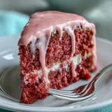 Blush Rosé Velvet Cake with creamy frosting, ready for celebration.